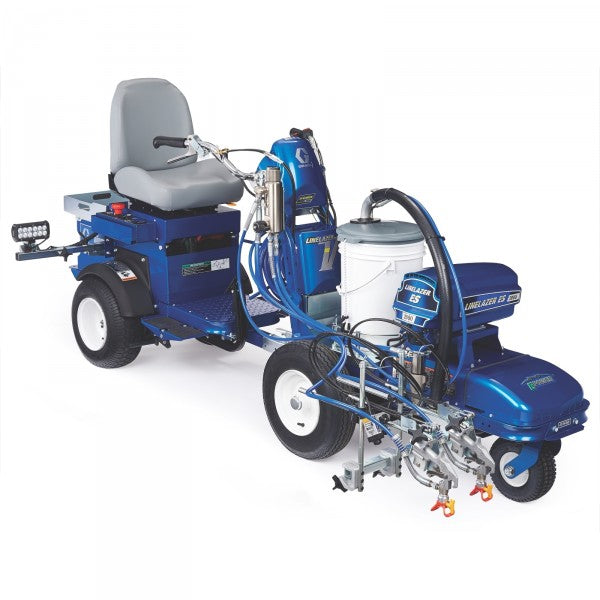 A Graco LineDriver ES Ride-On Attachment (4 AGM Batteries) attached to another device