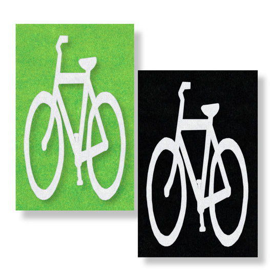 White preformed thermoplastic bicycle symbol on green and black contrast box