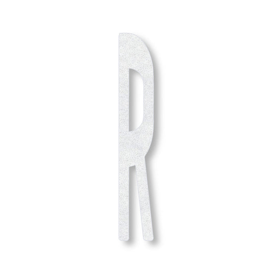A white preformed thermoplastic letter 6' R