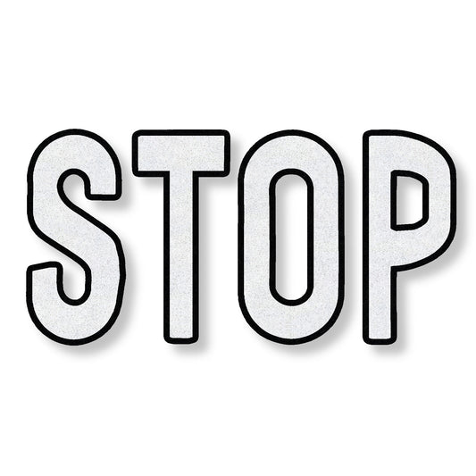 preformed thermoplastic STOP in all caps in white with a black border