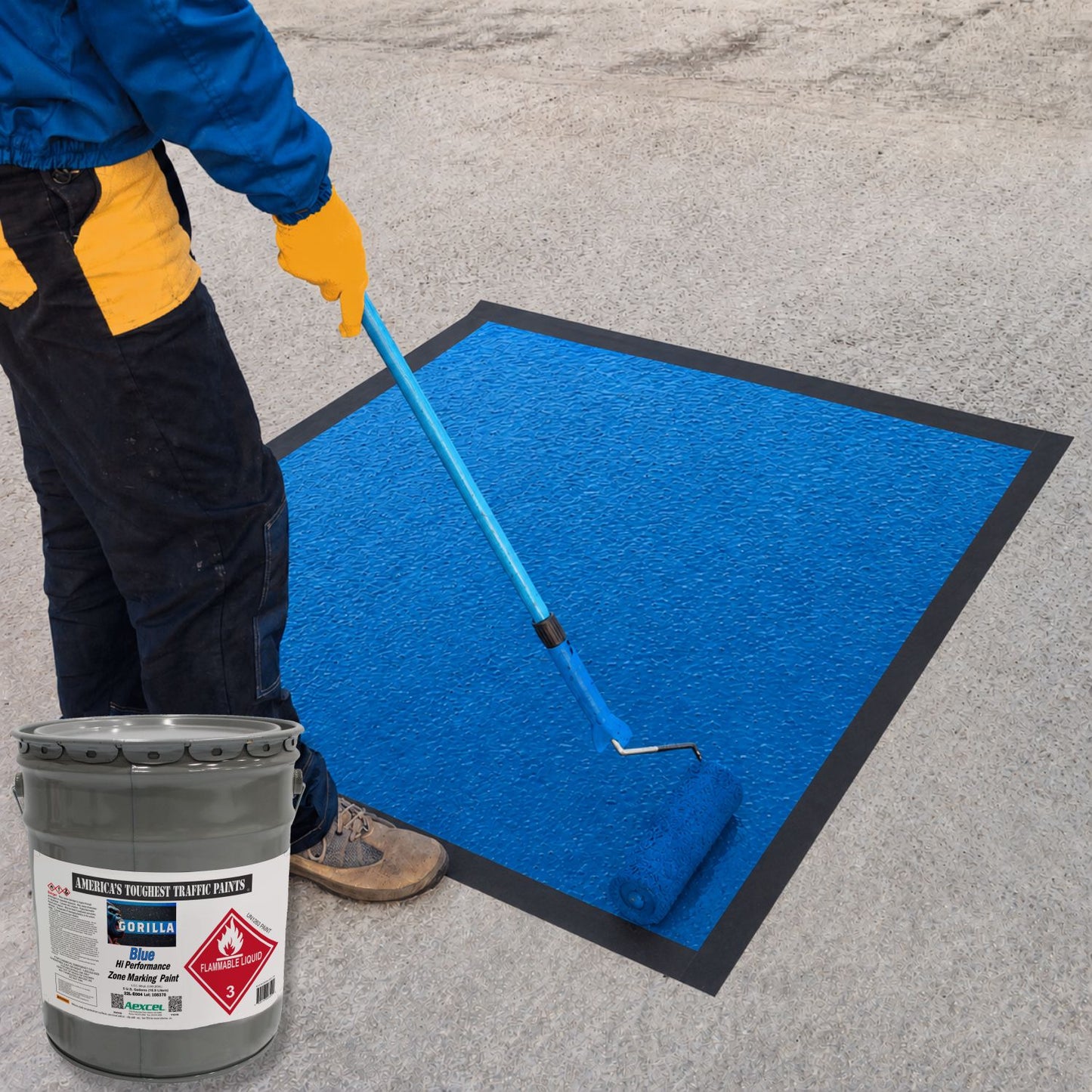 Worker applying blue ADA parking zone coating with a roller, using Aexcel Gorilla Traffic Marking Paint to create durable, high-visibility accessibility markings on concrete surfaces.