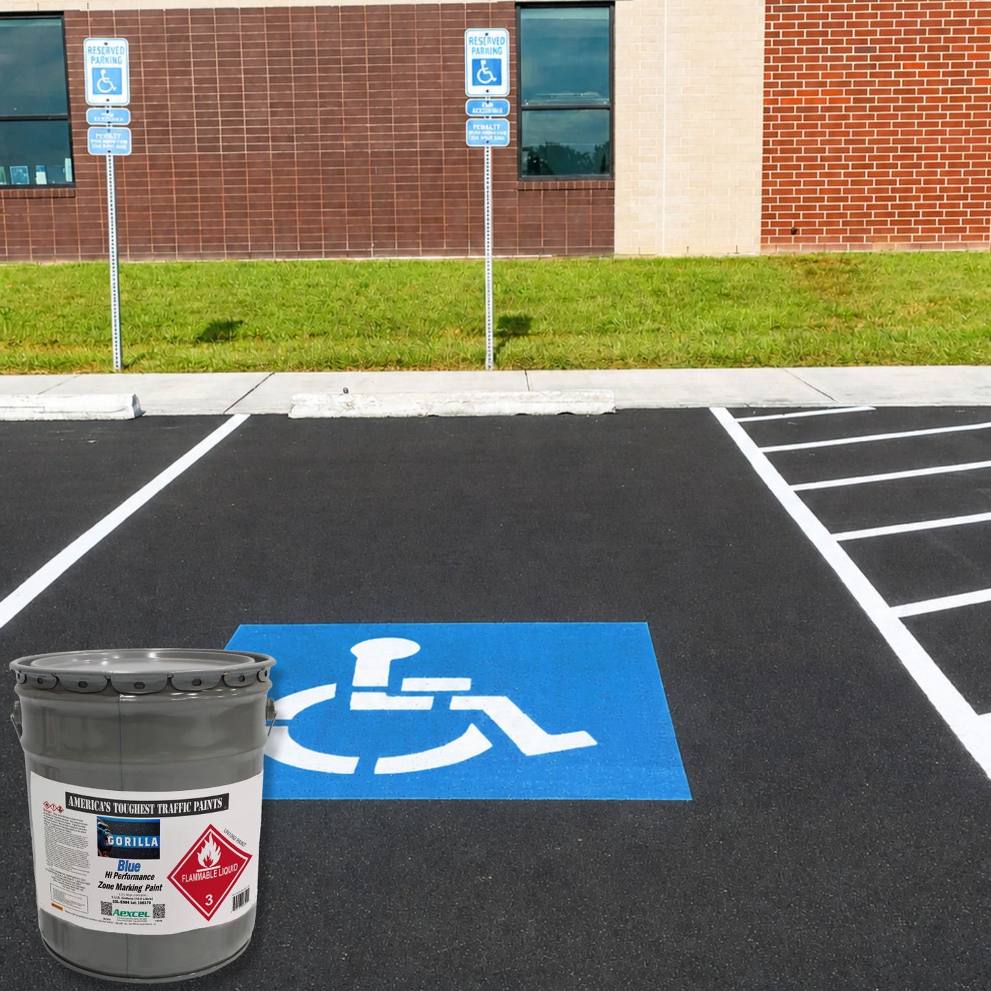 Blue ADA-accessible parking space symbol on freshly striped asphalt, showcasing Aexcel Gorilla Traffic Marking Paint’s durable, high-visibility performance for accessibility and parking lot markings.