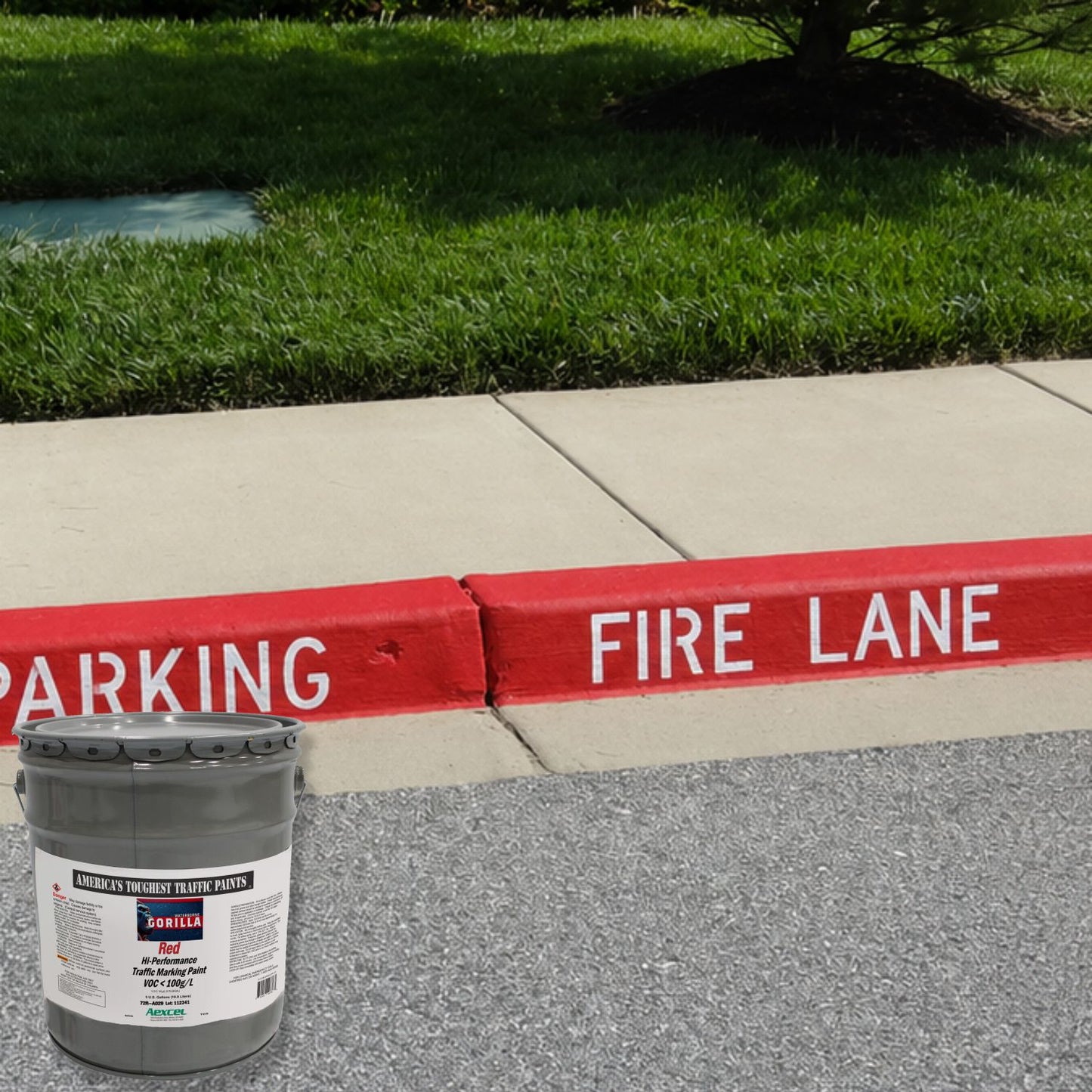 Red-painted fire lane curb marked with white lettering and Aexcel Gorilla Red Hi Performance Traffic Marking Paint.