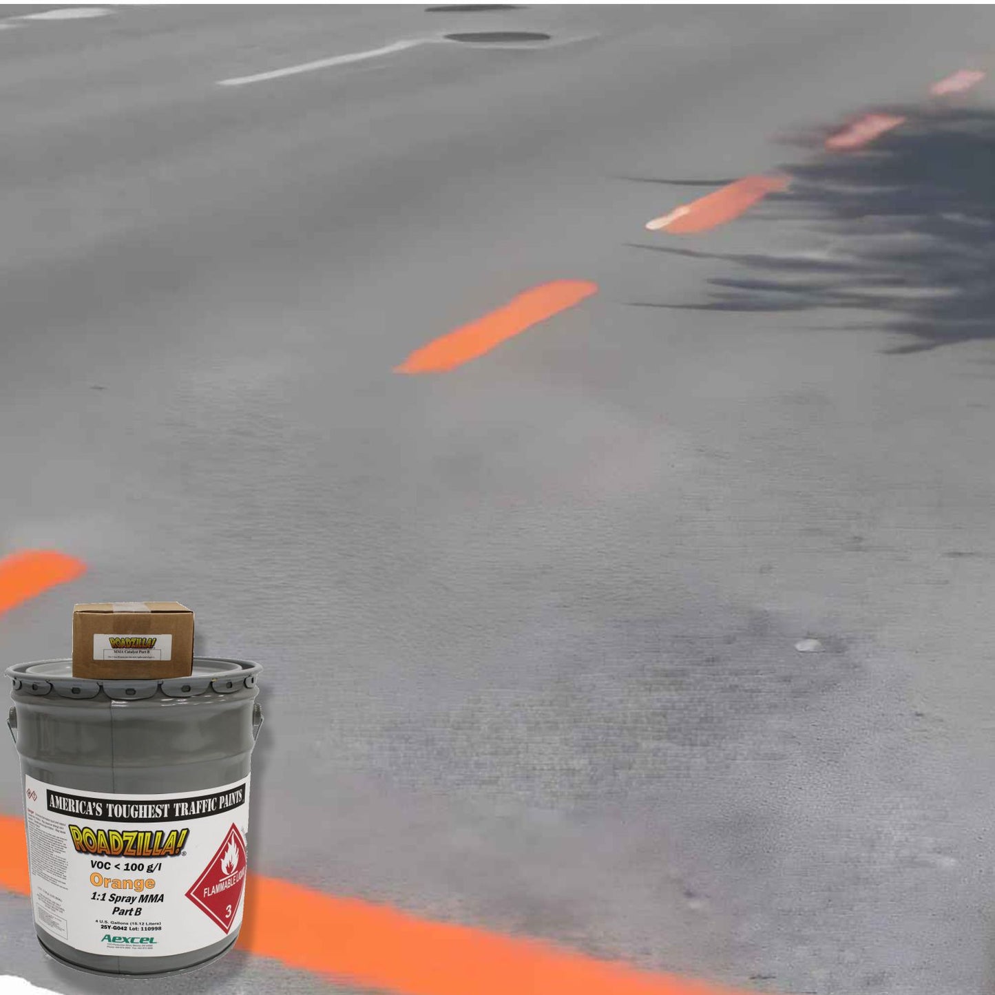 RoadZilla Orange MMA traffic marking paint used to create high-visibility temporary orange lane markings on a roadway construction project.