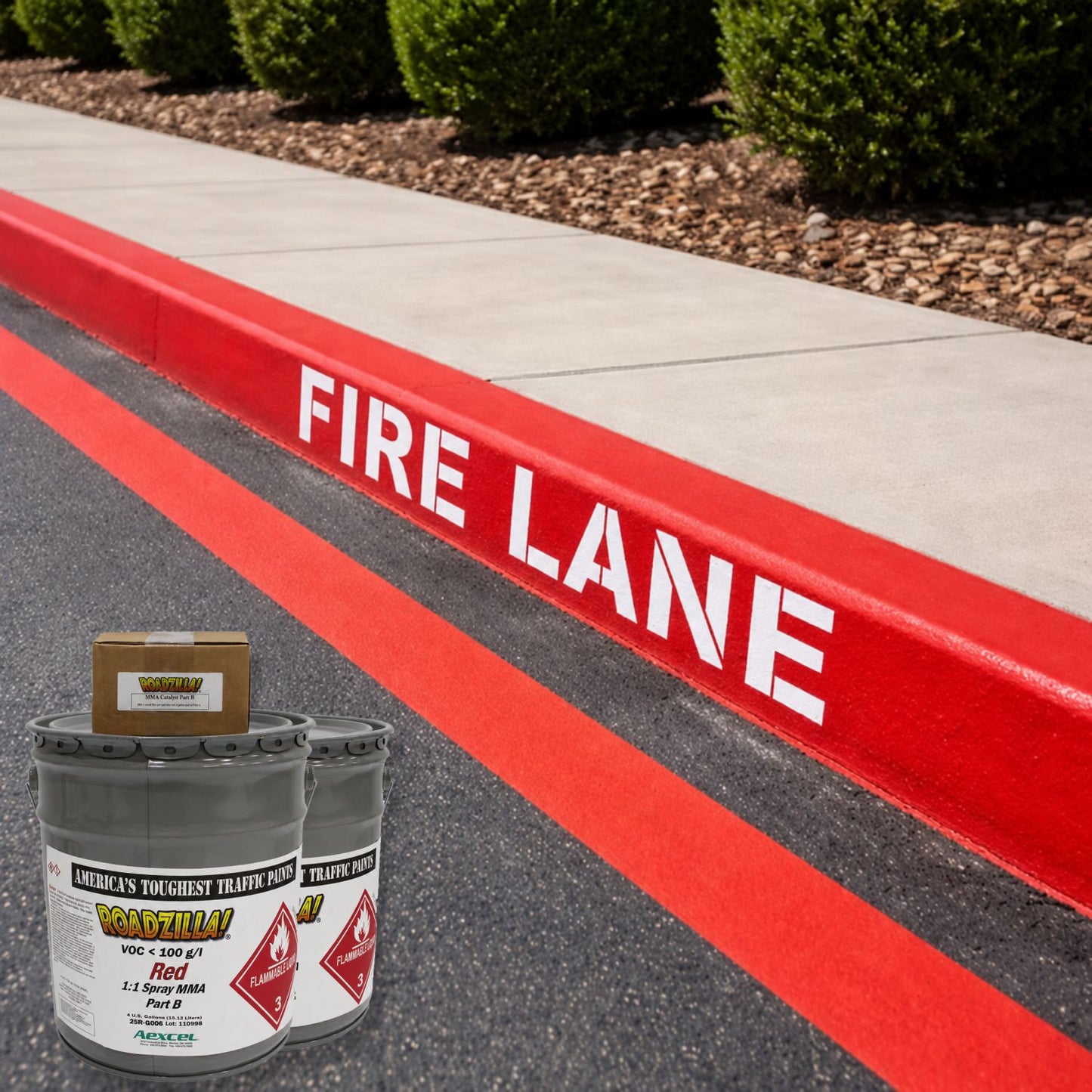 RoadZilla Red MMA Traffic Marking Paint used to create bright red fire lane curb markings and pavement striping with bold white "FIRE LANE" lettering for enhanced safety and regulatory compliance.