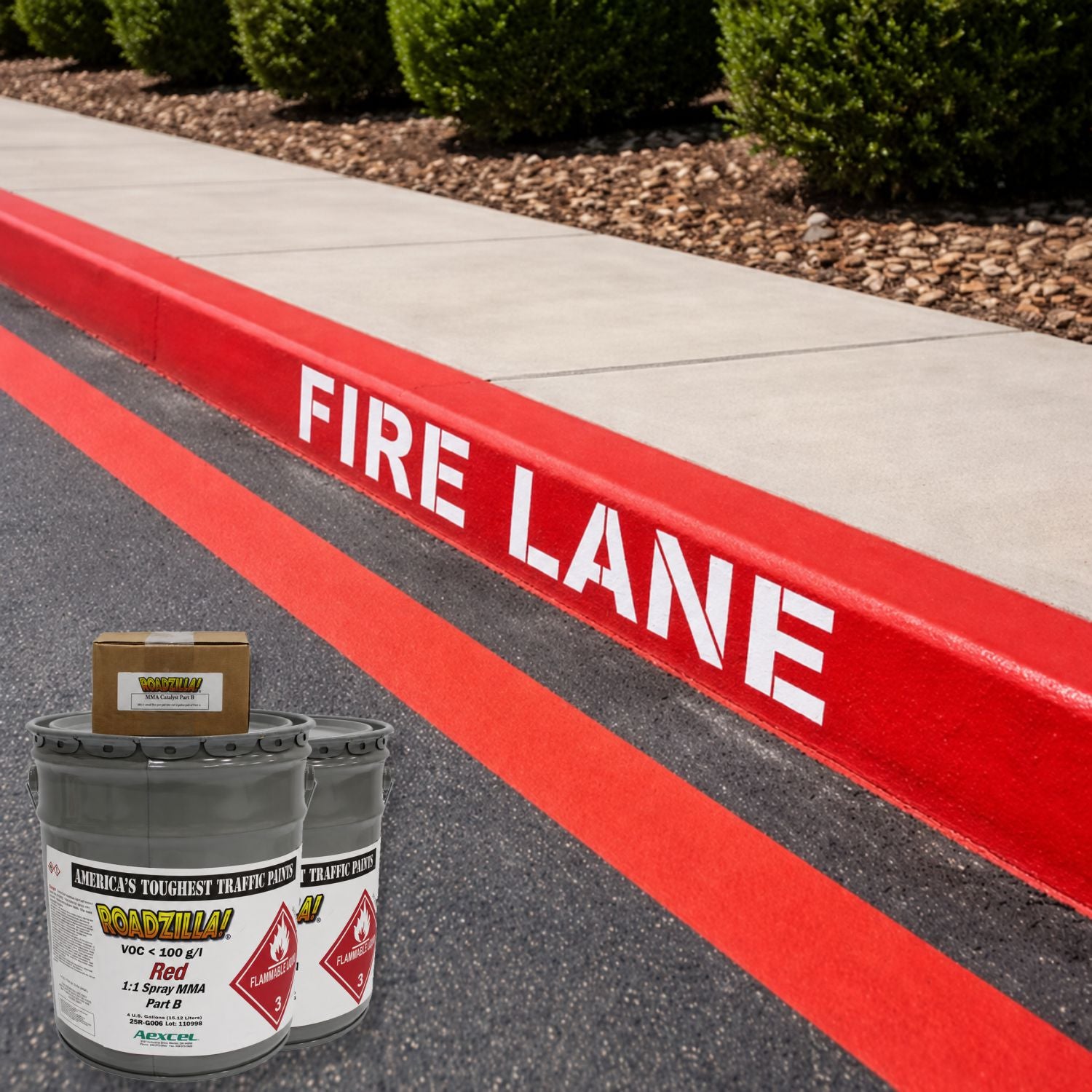 RoadZilla Red MMA Traffic Marking Paint used to create bright red fire lane curb markings and pavement striping with bold white "FIRE LANE" lettering for enhanced safety and regulatory compliance.