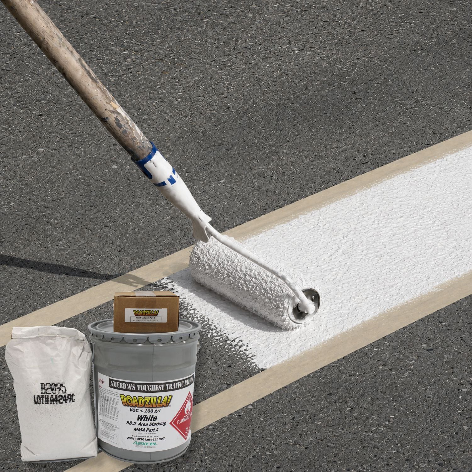 RoadZilla White MMA Area Marking System being applied with a roller to create a textured, high-build white pavement marking.