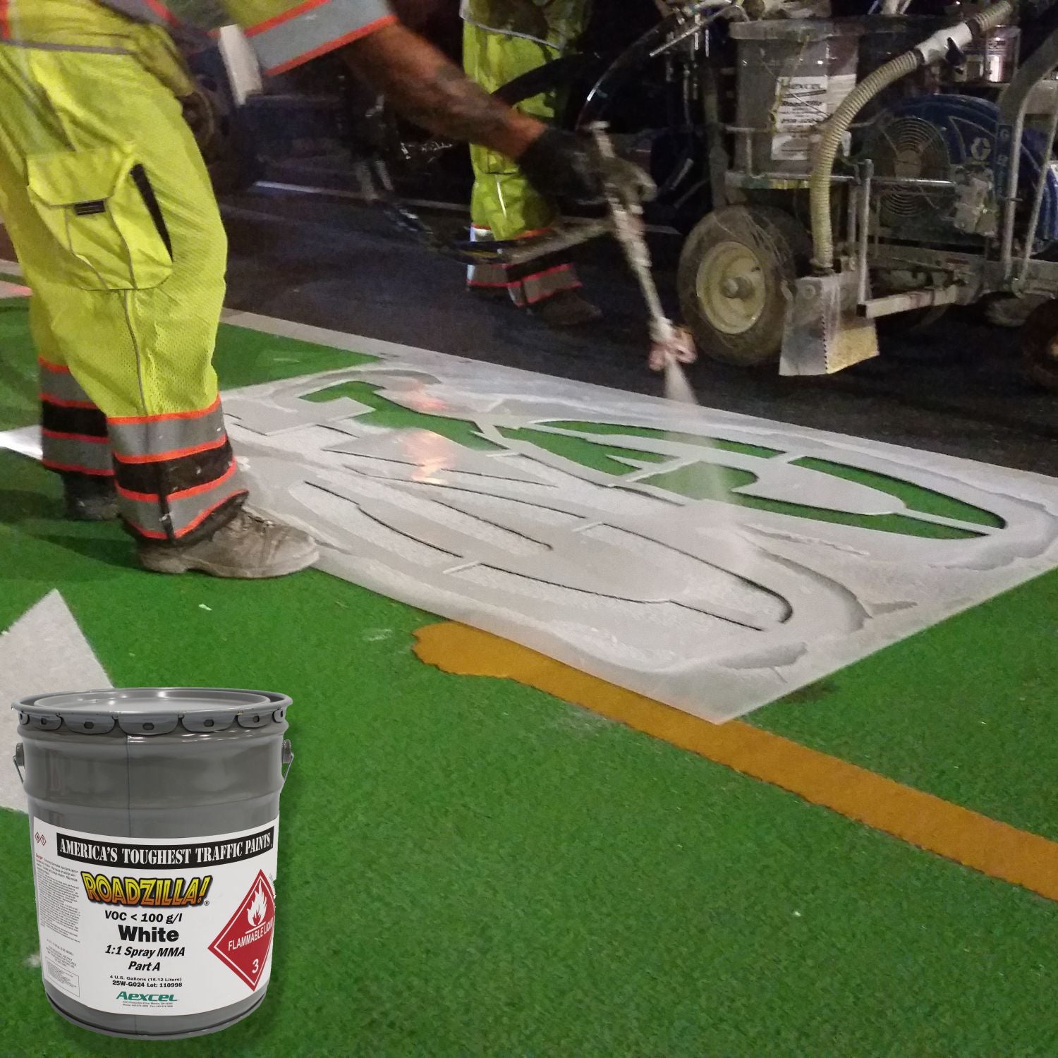 Road crew applies a large custom pavement stencil using Aexcel RoadZilla White MMA Traffic Marking Paint on a green bike lane or specialty pavement surface.