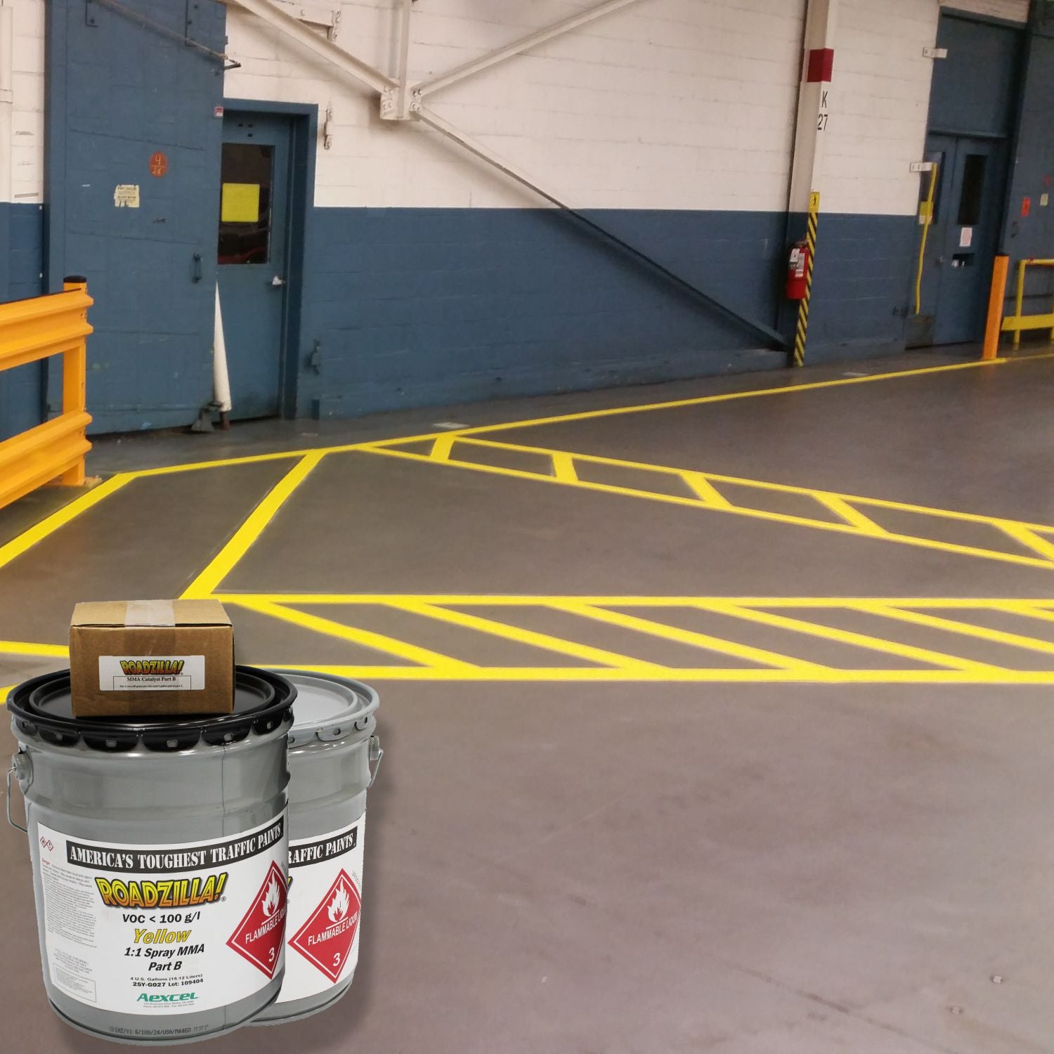 RoadZilla Yellow MMA Traffic Marking Paint used to create high-visibility yellow safety striping and crosshatched hazard zones inside an industrial facility, improving traffic flow and workplace safety.