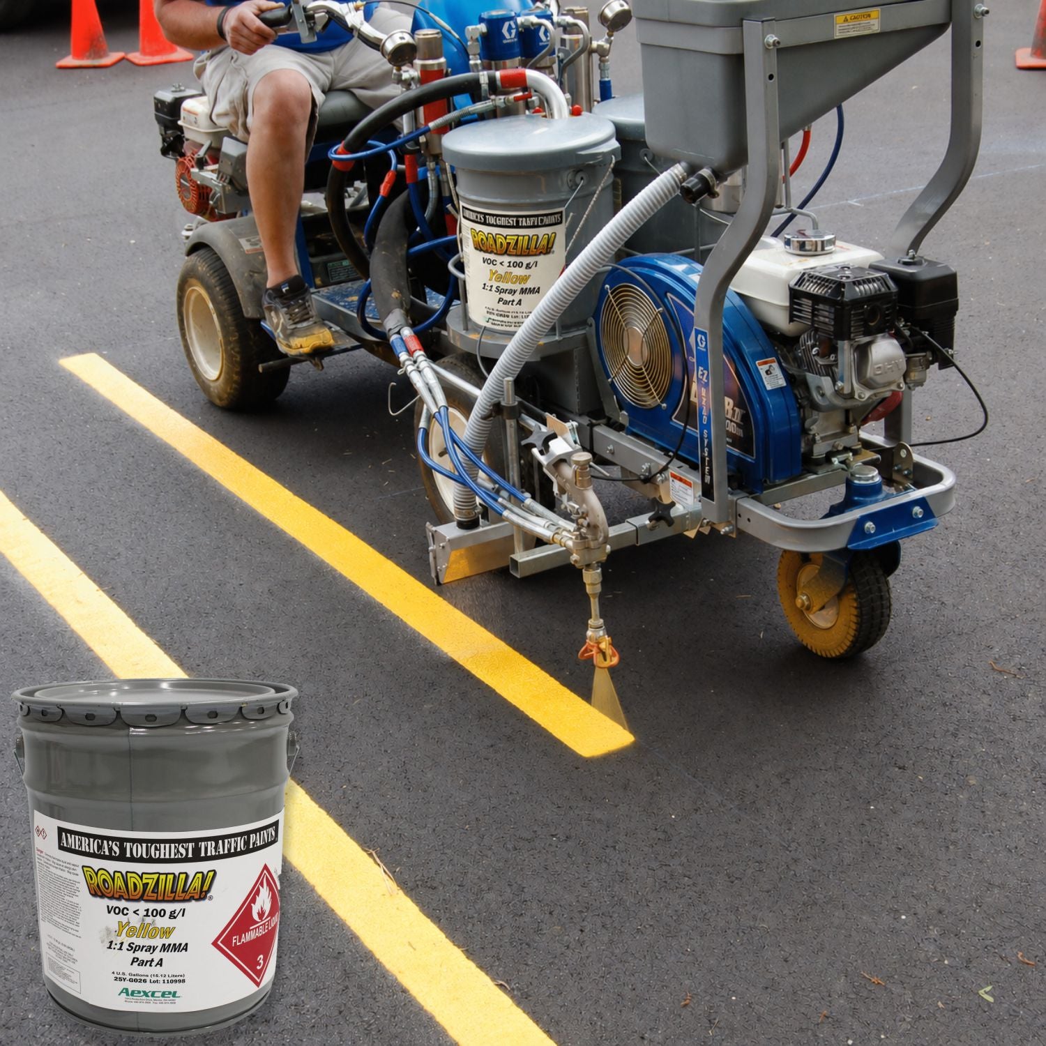 RoadZilla Yellow MMA Traffic Marking Paint being applied with a plural-component striping machine to create crisp yellow pavement lines on asphalt.