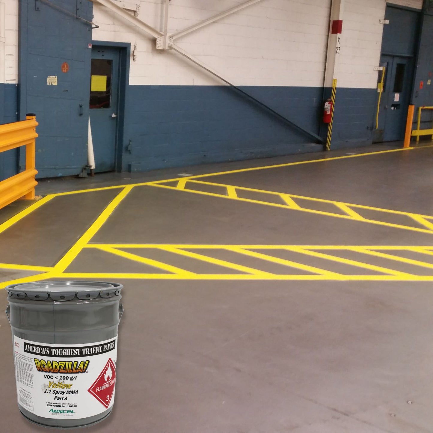 Industrial facility floor featuring bright yellow safety striping and crosshatched exclusion zones applied with RoadZilla Yellow MMA Traffic Marking Paint.