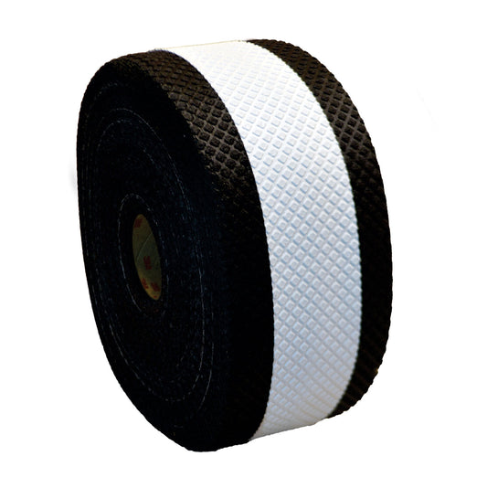 Roll of white textured tape with a black border.