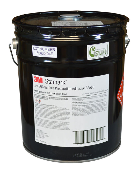 A black 5 gallon bucket with a label that says "3M Stamark Low VOC Surface Preparation Adhesive SPA 60.  NET 5 gallons/18.9 Liter Open head.  There is additional text but it is too small to read.
