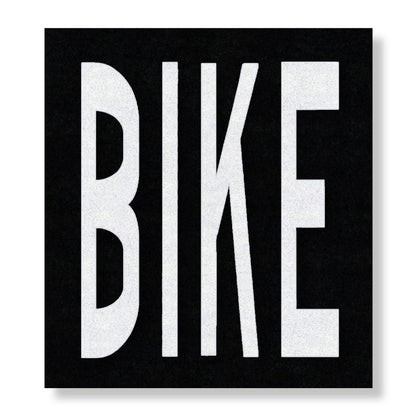 The word BIKE in all capital letters in white on a black rectangle