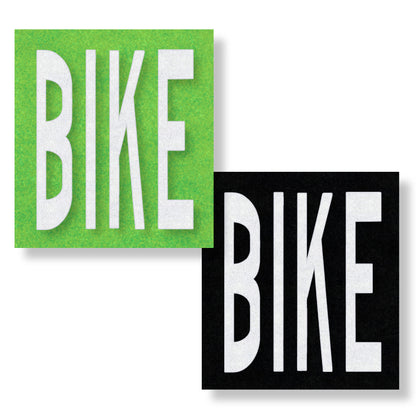 The word BIKE in all capital letters in white on black and green rectangles