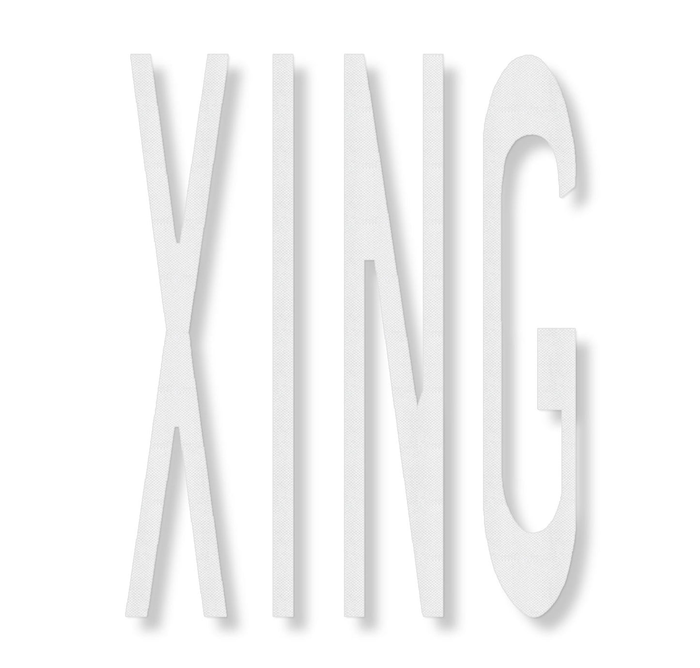 The word XING in textured white tape